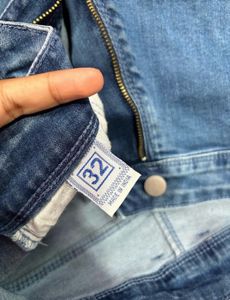 Distressed Blue Denim Jeans