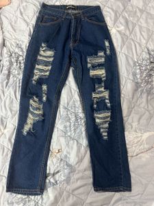 Distressed Blue Denim Jeans