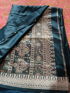 Elegant Teal Saree with Intricate silver Weave