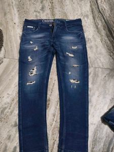 Calvin Klein trendy Distressed Blue Jeans for sale