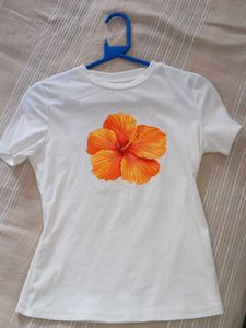 White T-Shirt with Orange Hibiscus Print