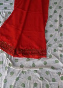 Elegant Red Saree with Gold Embellishments
