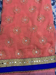 Coral And Blue Georgette Heavy Work Saree