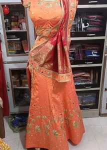 Designer Orange Embroidered Lehenga Choli