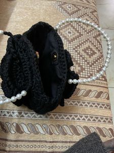 Elegant Black Textured Clutch Bag with Pearls