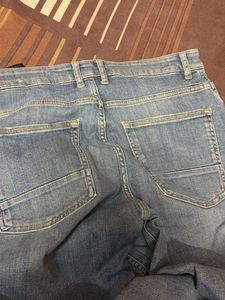 Light Wash Distressed Denim Jeans