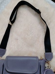 Stylish lavender crossbody bag with coin purse