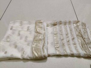 Elegant White Saree with Gold Border