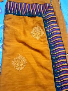 Elegant Mustard Saree with Embellished Border