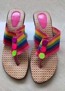 Vibrant Rainbow Flip Flops