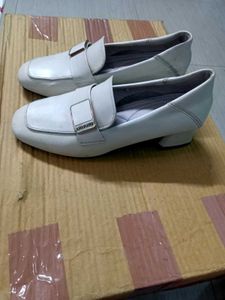 Stylish White Loafers with Buckle Accent