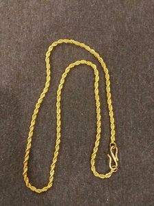 Golden Necklace and Pair of Earrings