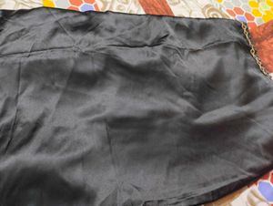 Elegant Black Silk Saree with Gold Border