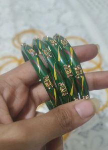Elegant Green Bangles with Gold Detailing