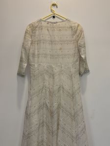 Elegant White Ethnic Gown with Silver Embellishmen