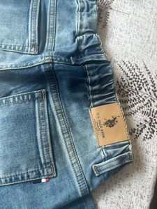 Distressed Blue Denim Jeans