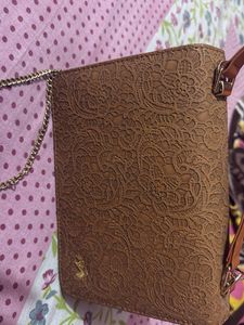 Elegant Embossed Clutch and sling bag