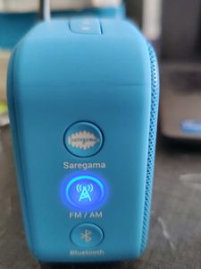 Saregama Carvaan Mini Legends in red, blue green