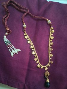 Elegant Gold Tone Necklace with Black Pendant