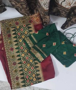 Elegant Maroon Saree with Embellishments