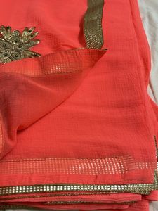 Stunning Coral Saree with Gold Border