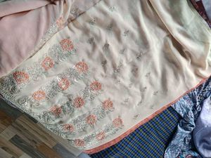 Orange Cream saree with blouse and peticoat