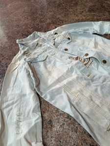 Distressed Light Wash Denim Jacket