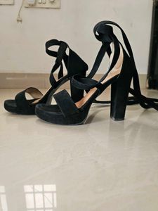 Black Platform Lace-Up Heels.