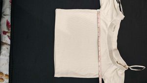 Off-white Short Top For Casual Wear.