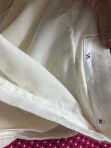 Elegant Cream Saree with Golden Border