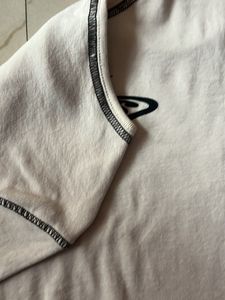 A symmetrical butterfly design crop top
