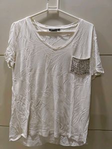 white tee with beeded pocket style