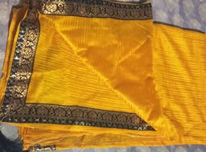 Elegant Yellow Saree with Embellished Border