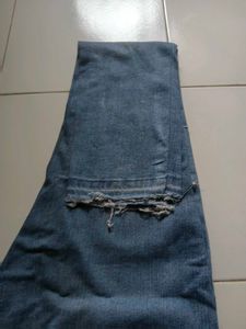 Distressed Blue Jeans with Paint Splatter