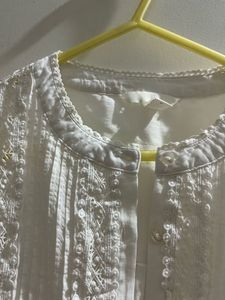 Elegant White Embroidered Blouse