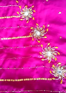 Elegant Pink Saree with Gold Embellishments