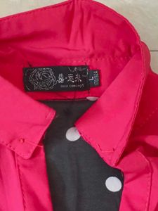 Hot Pink Button-Up Shirt with Polka Dot Accent