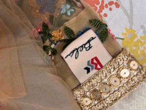 Powder blue floral net saree