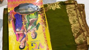 Elegant Green Silk Saree with Gold Border