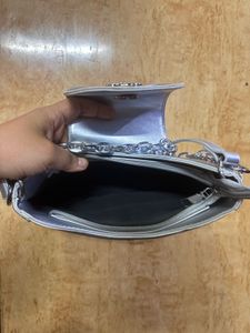 silver shoulder bag