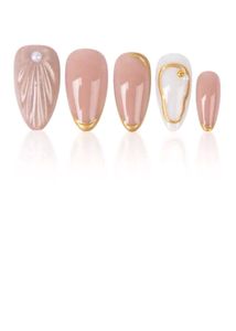 Elegant Almond Nails with Gold Accent