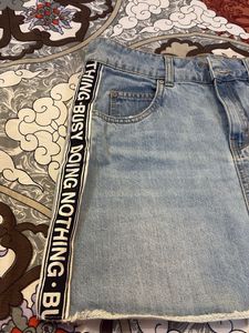 Stylish Light Blue Denim Mini Skirt with Side Tape