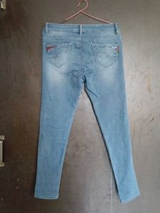 Ripped Knee Denim Jeans