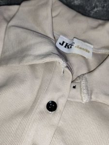 Cream Sleeveless Collared Top