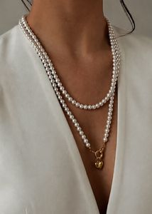 Elegant Pearl Necklace with Gold Heart Charm
