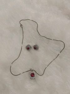 Diamond and ruby pendant set