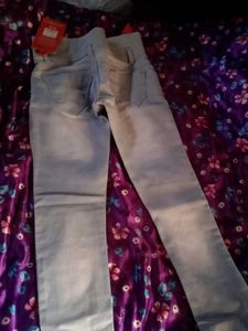 Stylish Ripped Jeans with Embellishments