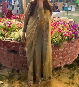 Elegant Golden Saree with Embellished Border