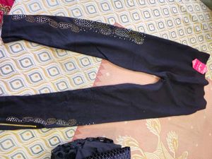 beautiful black beads with golden zip leggings