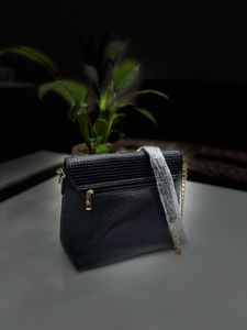 Leather Sling Bag.